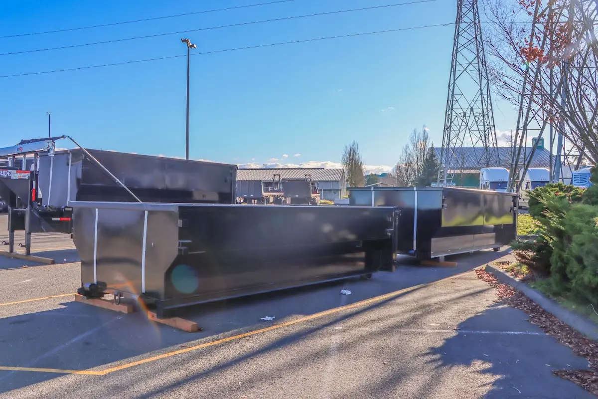 Roll-off dumpster ready for waste disposal at job site for 4 Yard Dumpster Rental in Brownsville